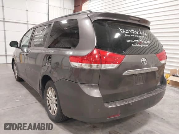 ✅ 2011 Toyota Sienna XLE • VIN: 5TDDK3DC1BS010103 • Lot: 41298618. Listed on IAAI with 304,384 mi. Free auction sales archive from the USA and detailed vehicle history report at DreamBid. Image 3.