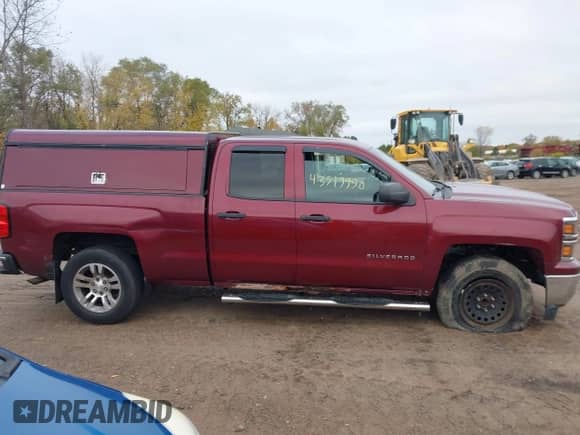 2014 Chevrolet Silverado 1500 LT z VIN 1GCRCREH1EZ403294, wystawiony jako IAAI lot #43519990 z przebiegiem 229 946 mil mil oraz . Historia ofert i sprzedaży dostępna na DreamBid. Obrazek 13.