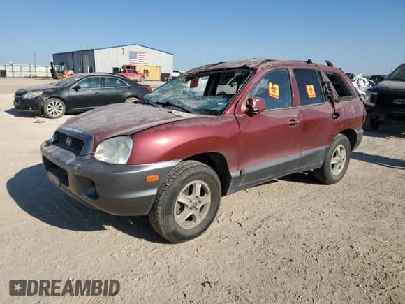 2003 Hyundai Santa Fe GLS z VIN KM8SC13D23U448494, wystawiony jako Copart lot #62625224 z przebiegiem 7 094 mil mil oraz Szkoda całkowita • Salvage title. Historia ofert i sprzedaży dostępna na DreamBid. Obrazek 1.