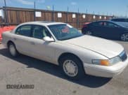 ✅ 1997 Lincoln Continental • VIN: 1LNLM97V4VY622662 • Lot: 40301011. Listed on IAAI with 129,028 mi. Free auction sales archive from the USA and detailed vehicle history report at DreamBid. Image 1.