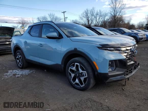 2024 Hyundai Santa Cruz Limited z VIN 5NTJEDAF7RH100548, wystawiony jako Copart lot #88242865 z przebiegiem 4 696 mil mil oraz Szkoda całkowita • Salvage title. Historia ofert i sprzedaży dostępna na DreamBid. Obrazek 4.