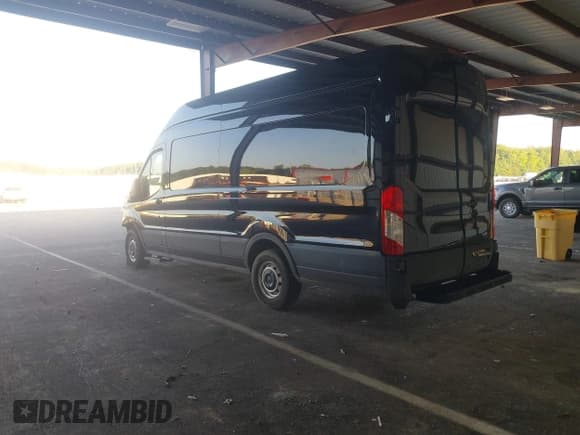 ✅ 2021 Ford Transit Cargo • VIN: 1FTBR3XG8MKA89703 • Lot: 42885214. Listed on IAAI with 79,907 mi. Free auction sales archive from the USA and detailed vehicle history report at DreamBid. Image 3.