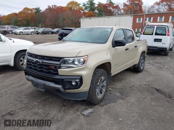 ✅ 2022 Chevrolet Colorado 4WD Z71 • VIN: 1GCGTDEN8N1296338 • Lot: 43591648. Listed on IAAI with 60,426 mi. Free auction sales archive from the USA and detailed vehicle history report at DreamBid. Image 2.