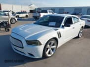✅ 2014 Dodge Charger SXT Plus • VIN: 2C3CDXHG8EH287560 • Lot: 43116564. Listed on IAAI with 194,629 mi. Free auction sales archive from the USA and detailed vehicle history report at DreamBid. Image 18.