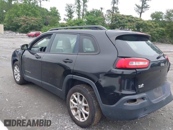 ✅ 2015 Jeep Cherokee Sport • VIN: 1C4PJLAB0FW761467 • Lot: 42362433. Listed on IAAI with 133,794 mi. Free auction sales archive from the USA and detailed vehicle history report at DreamBid. Image 14.