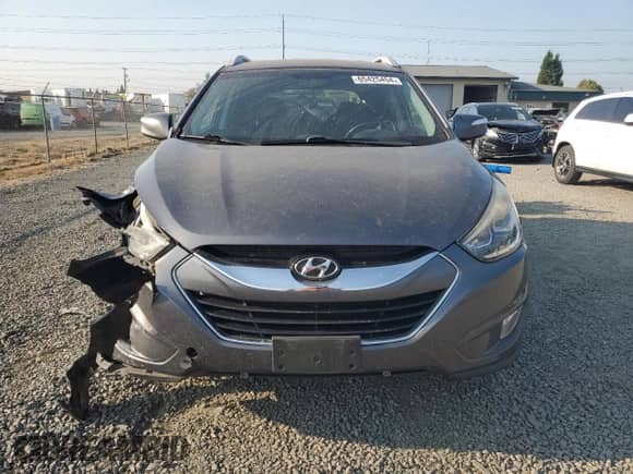 2014 Hyundai Tucson Limited z VIN KM8JUCAG5EU862258, wystawiony jako Copart lot #65425454 z przebiegiem 82 013 mil mil oraz Szkoda całkowita • Salvage title. Historia ofert i sprzedaży dostępna na DreamBid. Obrazek 5.