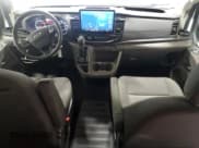 ✅ 2023 Ford Transit Passenger XL • VIN: 1FBAX2YG0PKA93523 • Лот: 85100115. Опубликован ранее на Copart с пробегом 49 737 миль. Бесплатный доступ к архиву аукционных продаж из США и подробный отчёт об истории автомобиля на DreamBid. Изображение 8.