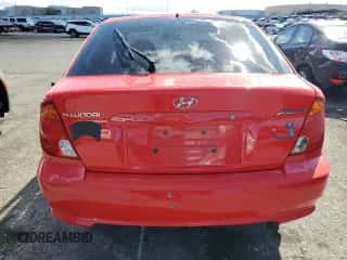 2005 Hyundai Accent GLS z VIN KMHCG35C85U333815, wystawiony jako Copart lot #48927895 z przebiegiem 108 933 mil mil oraz Szkoda całkowita • Salvage title. Historia ofert i sprzedaży dostępna na DreamBid. Obrazek 6.