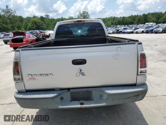 ✅ 2007 Mitsubishi Raider LS • VIN: 1Z7HC22K77S125228 • Lot: 62816695. Wystawiony na Copart z przebiegiem 194 397 mil. Bezpłatny archiwum sprzedaży aukcyjnych z USA i szczegółowy raport historii pojazdu na DreamBid. Zdjęcie 6.