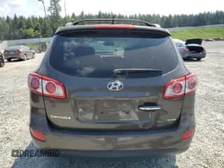 2012 Hyundai Santa Fe Limited с VIN 5XYZK4AG5CG154058, выставлен на аукционе Copart как лот 67898394 с пробегом 94 880 миль миль и Списание • Salvage title. История ставок и продаж доступна на DreamBid. Изображение 6.