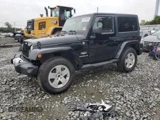 ✅ 2011 Jeep Wrangler Sahara • VIN: 1J4AA5D16BL517963 • Lot: 69210635. Listed on Copart with 171,839 mi. Free auction sales archive from the USA and detailed vehicle history report at DreamBid. Image 1.