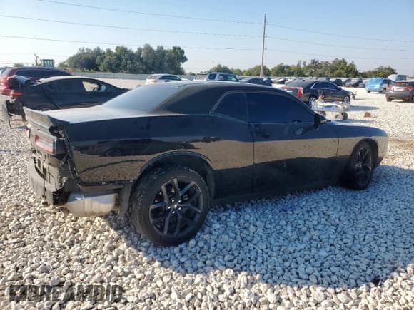 ✅ 2023 Dodge Challenger SXT • VIN: 2C3CDZAG4PH606252 • Lot: 84660345. Wystawiony na Copart z przebiegiem 21 784 mil. Bezpłatny archiwum sprzedaży aukcyjnych z USA i szczegółowy raport historii pojazdu na DreamBid. Zdjęcie 3.