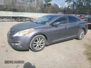 2013 Hyundai Azera z VIN KMHFG4JG8DA260165, wystawiony jako Copart lot #88471865 z przebiegiem 97 244 mil mil oraz Szkoda całkowita • Salvage title. Historia ofert i sprzedaży dostępna na DreamBid. Obrazek 1.