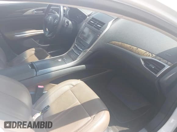 ✅ 2016 Lincoln MKZ Hybrid • VIN: 3LN6L2LU9GR608424 • Лот: 43091080. Опубликован ранее на IAAI с пробегом 170 497 миль. Бесплатный доступ к архиву аукционных продаж из США и подробный отчёт об истории автомобиля на DreamBid. Изображение 5.