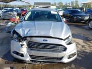✅ 2014 Ford Fusion SE • VIN: 3FA6P0H7XER146801 • Lot: 43416256. Listed on IAAI with 90,675 mi. Free auction sales archive from the USA and detailed vehicle history report at DreamBid. Image 13.