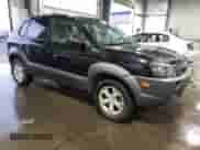 2009 Hyundai Tucson SE with VIN KM8JN12D79U114445, listed as a Copart auction lot 76508704 with 162,112 mi miles and Salvage title. Bid and sale history available at DreamBid. Image 4.