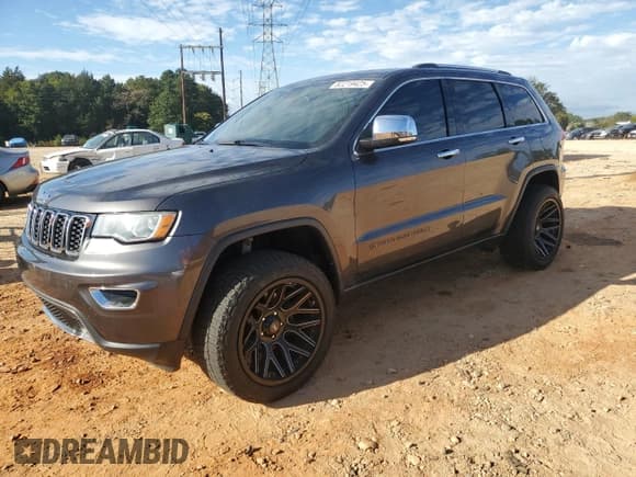 ✅ 2017 Jeep Grand Cherokee Limited • VIN: 1C4RJFBG0HC867216 • Lot: 82219425. Listed on Copart with 145,884 mi. Free auction sales archive from the USA and detailed vehicle history report at DreamBid. Image 1.