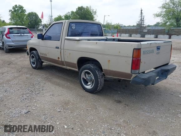 ✅ 1986 Nissan Hardbody E • VIN: JN6ND11S0GW000696 • Lot: 42358321. Listed on IAAI with 445,199 mi. Free auction sales archive from the USA and detailed vehicle history report at DreamBid. Image 3.