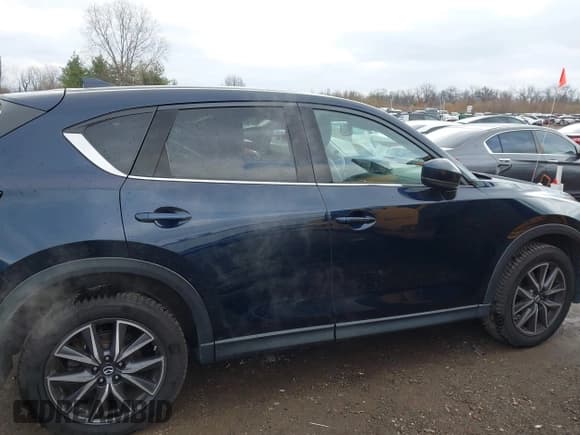 ✅ 2018 Mazda CX-5 Grand Touring • VIN: JM3KFBDM5J0426677 • Lot: 43579829. Listed on IAAI with 94,077 mi. Free auction sales archive from the USA and detailed vehicle history report at DreamBid. Image 13.