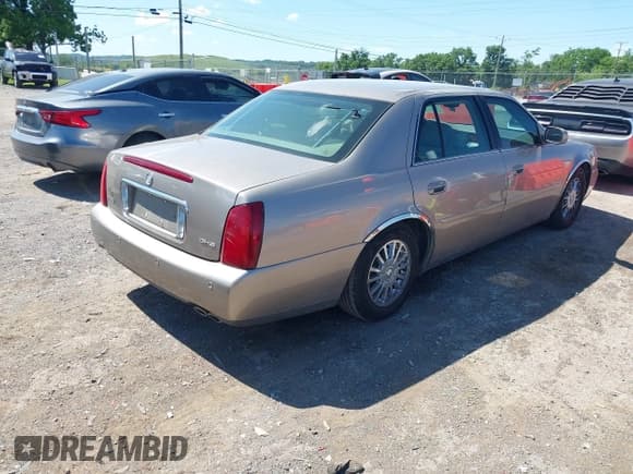 ✅ 2004 Cadillac DeVille DHS • VIN: 1G6KE54Y04U130501 • Lot: 42318769. Listed on IAAI with 81,512 mi. Free auction sales archive from the USA and detailed vehicle history report at DreamBid. Image 4.
