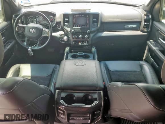 2020 Ram 1500 Rebel z VIN 1C6SRFLM5LN364977, wystawiony jako Copart lot #70115965 z przebiegiem 96 631 mil mil oraz Szkoda całkowita • Salvage title. Historia ofert i sprzedaży dostępna na DreamBid. Obrazek 8.