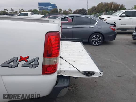 2002 Chevrolet Silverado 1500 LS with VIN 1GCEK14T32Z255752, listed as a IAAI auction lot 42347450 with 145,616 mi miles and . Bid and sale history available at DreamBid. Image 16.