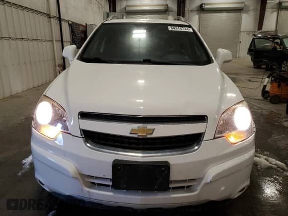 2014 Chevrolet Captiva Sport LTZ с VIN 3GNAL4EK9ES547787, выставлен на аукционе Copart как лот 84344734 с пробегом 77 598 миль миль и Списание • Salvage title. История ставок и продаж доступна на DreamBid. Изображение 5.