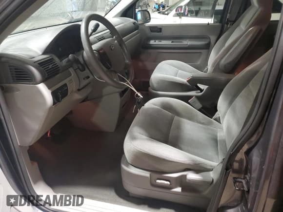 ✅ 2004 Ford Freestar SE • VIN: 2FMZA51684BA93645 • Lot: 82252124. Listed on Copart with 126,377 mi. Free auction sales archive from the USA and detailed vehicle history report at DreamBid. Image 7.