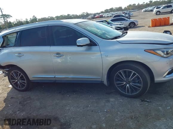 ✅ 2020 Infiniti QX60 Luxe • VIN: 5N1DL0MN9LC535891 • Lot: 41549458. Listed on IAAI with 39,409 mi. Free auction sales archive from the USA and detailed vehicle history report at DreamBid. Image 13.