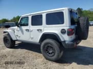 ✅ 2022 Jeep Wrangler Unlimited Rubicon • VIN: 1C4JJXFG0NW127415 • Lot: 52253935. Listed on Copart with 36,988 mi. Free auction sales archive from the USA and detailed vehicle history report at DreamBid. Image 2.