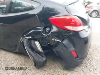 2012 Hyundai Veloster w/Red Int z VIN KMHTC6AD8CU072100, wystawiony jako IAAI lot #43427707 z przebiegiem 178 258 mil mil oraz . Historia ofert i sprzedaży dostępna na DreamBid. Obrazek 6.