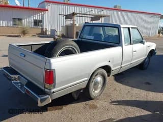 ✅ 1986 Nissan 720 • VIN: JN6ND06SXGW114112 • Lot: 41254610. Wystawiony na IAAI z przebiegiem 156 099 mil. Bezpłatny archiwum sprzedaży aukcyjnych z USA i szczegółowy raport historii pojazdu na DreamBid. Zdjęcie 4.