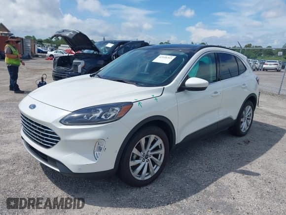 ✅ 2022 Ford Escape Titanium Hybrid • VIN: 1FMCU9DZ7NUA91505 • Lot: 42958203. Listed on IAAI with 34,438 mi. Free auction sales archive from the USA and detailed vehicle history report at DreamBid. Image 2.
