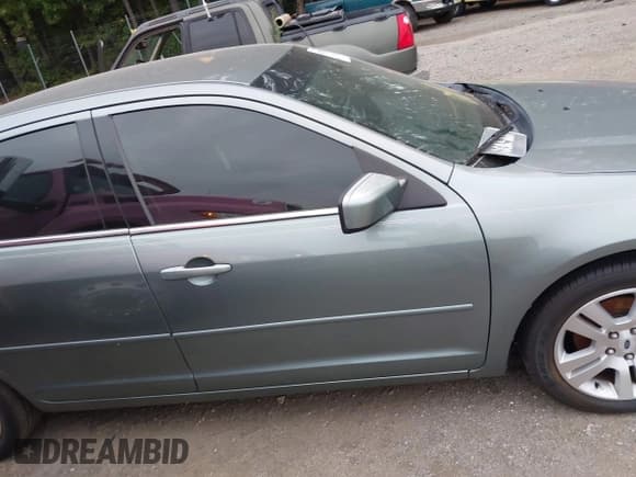 ✅ 2006 Ford Fusion SEL • VIN: 3FAHP08146R130423 • Lot: 43119025. Listed on IAAI with 143,173 mi. Free auction sales archive from the USA and detailed vehicle history report at DreamBid. Image 13.