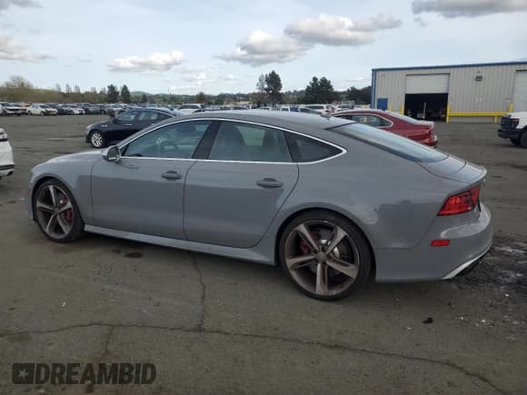 ✅ 2015 Audi RS 7 Prestige • VIN: WUAW2AFC0FN900729 • Lot: 52392835. Listed on Copart with 47,915 mi. Free auction sales archive from the USA and detailed vehicle history report at DreamBid. Image 2.