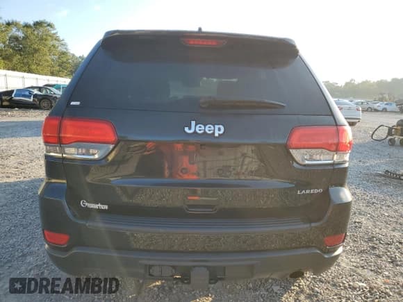 ✅ 2015 Jeep Grand Cherokee Laredo • VIN: 1C4RJEAG2FC707086 • Lot: 84167785. Listed on Copart with 100,035 mi. Free auction sales archive from the USA and detailed vehicle history report at DreamBid. Image 6.