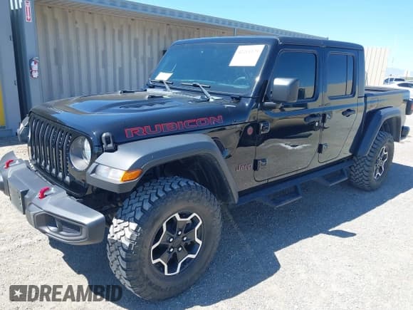 ✅ 2023 Jeep Gladiator Rubicon • VIN: 1C6JJTBG3PL531982 • Lot: 42211139. Listed on IAAI with 28,301 mi. Free auction sales archive from the USA and detailed vehicle history report at DreamBid. Image 2.