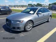 ✅ 2016 Audi A6 Premium Plus • VIN: WAUFGAFC3GN031668 • Lot: 43341213. Wystawiony na IAAI z przebiegiem 94 555 mil. Bezpłatny archiwum sprzedaży aukcyjnych z USA i szczegółowy raport historii pojazdu na DreamBid. Zdjęcie 2.