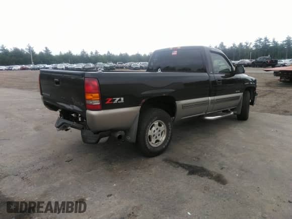 2002 Chevrolet Silverado 1500 LS with VIN 1GCEK14T72Z273185, listed as a IAAI auction lot 34055338 with 123,301 mi miles and . Bid and sale history available at DreamBid. Image 4.