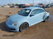 ✅ 2012 Volkswagen Beetle 2.5L • VIN: 3VWJX7AT0CM614269 • Lot: 43772516. Listed on IAAI with 129,147 mi. Free auction sales archive from the USA and detailed vehicle history report at DreamBid. Image 2.