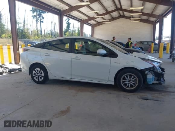 ✅ 2016 Toyota Prius Four • VIN: JTDKARFUXG3012069 • Lot: 42759381. Listed on IAAI with 152,954 mi. Free auction sales archive from the USA and detailed vehicle history report at DreamBid. Image 14.