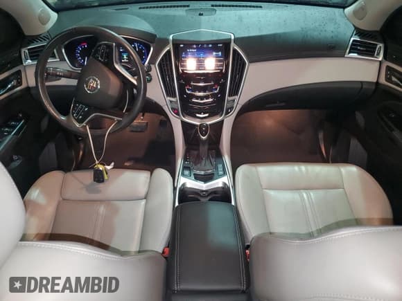 ✅ 2016 Cadillac SRX Luxury Collection • VIN: 3GYFNBE36GS569331 • Lot: 86246305. Wystawiony na Copart z przebiegiem 54 067 mil. Bezpłatny archiwum sprzedaży aukcyjnych z USA i szczegółowy raport historii pojazdu na DreamBid. Zdjęcie 8.