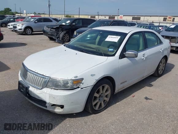 ✅ 2006 Lincoln Zephyr • VIN: 3LNHM26156R630099 • Lot: 42866819. Wystawiony na IAAI z przebiegiem 296 172 mil. Bezpłatny archiwum sprzedaży aukcyjnych z USA i szczegółowy raport historii pojazdu na DreamBid. Zdjęcie 12.