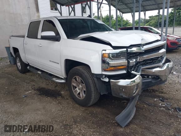 ✅ 2018 Chevrolet Silverado 1500 LT • VIN: 3GCUKREC1JG123404 • Лот: 42521998. Опубликован ранее на IAAI с пробегом 95 936 миль. Бесплатный доступ к архиву аукционных продаж из США и подробный отчёт об истории автомобиля на DreamBid. Изображение 1.