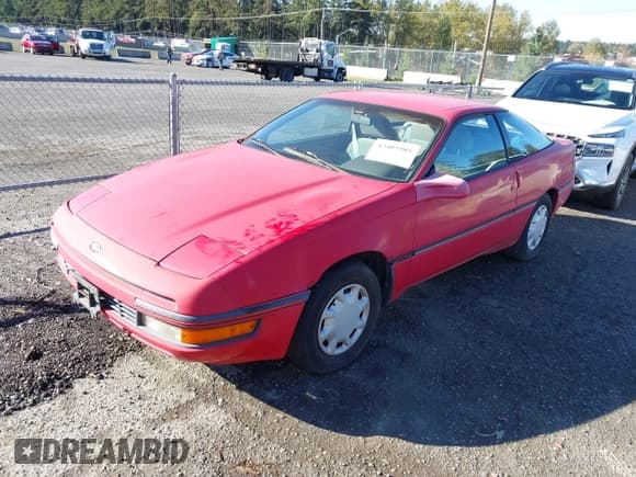 ✅ 1990 Ford Probe • VIN: 1ZVPT21UXL5181289 • Лот: 43405985. Опубликован ранее на IAAI с пробегом 136 095 миль. Бесплатный доступ к архиву аукционных продаж из США и подробный отчёт об истории автомобиля на DreamBid. Изображение 2.