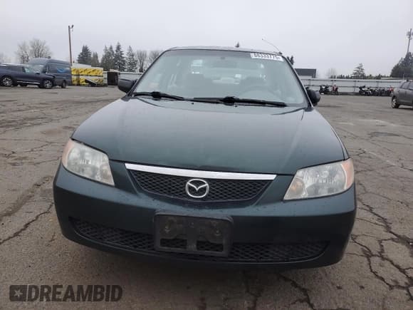✅ 2001 Mazda Protege DX • VIN: JM1BJ222910404111 • Лот: 88333775. Опубликован ранее на Copart с пробегом 171 876 миль. Бесплатный доступ к архиву аукционных продаж из США и подробный отчёт об истории автомобиля на DreamBid. Изображение 5.