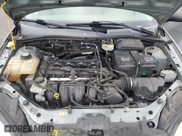 ✅ 2006 Ford Focus S • VIN: 1FAFP34N56W242498 • Lot: 91859985. Wystawiony na Copart z przebiegiem 70 540 mil. Bezpłatny archiwum sprzedaży aukcyjnych z USA i szczegółowy raport historii pojazdu na DreamBid. Zdjęcie 11.