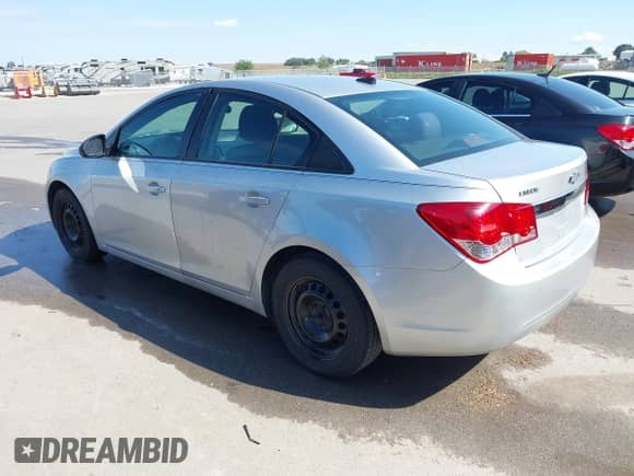 2013 Chevrolet Cruze LS z VIN 1G1PA5SH5D7145164, wystawiony jako IAAI lot #43294377 z przebiegiem 191 872 mil mil oraz . Historia ofert i sprzedaży dostępna na DreamBid. Obrazek 3.