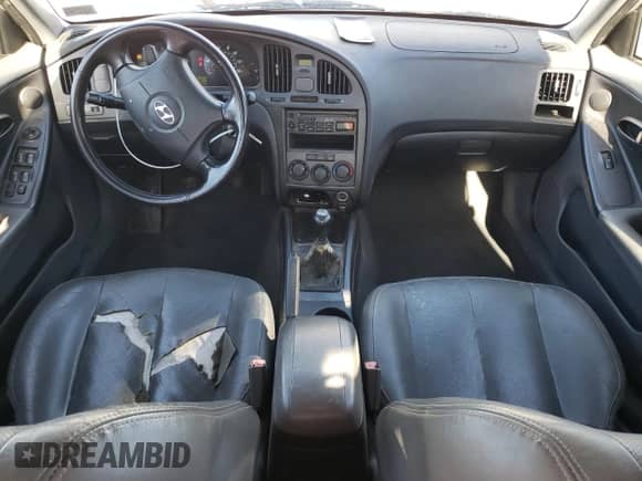 2005 Hyundai Elantra GLS z VIN KMHDN56D55U136582, wystawiony jako Copart lot #79481364 z przebiegiem 180 298 mil mil oraz Szkoda całkowita • Salvage title. Historia ofert i sprzedaży dostępna na DreamBid. Obrazek 8.