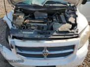 ✅ 2010 Dodge Caliber SXT • VIN: 1B3CB4HA9AD534279 • Лот: 72930874. Опубликован ранее на Copart с пробегом 204 836 миль. Бесплатный доступ к архиву аукционных продаж из США и подробный отчёт об истории автомобиля на DreamBid. Изображение 12.